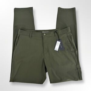 NEW Rhone Resort Pant Stretch Slim Fit Travel Quick Dry 35 x 33 Survivor Green